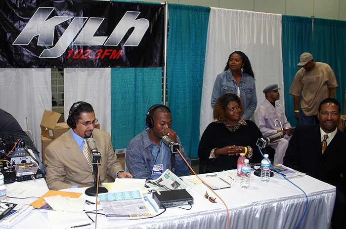 The staff of KJLH radio, owned by Stevie Wonder, working the booth at Black Business Expo in Los Angeles Convention Center