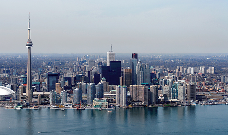 Lake Ontario frames the notable Toronto skyline