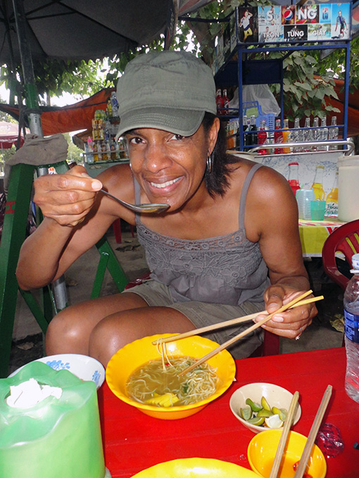 Jeanette Valentine of SoulOfAmerica eating Pho in Chau Doc