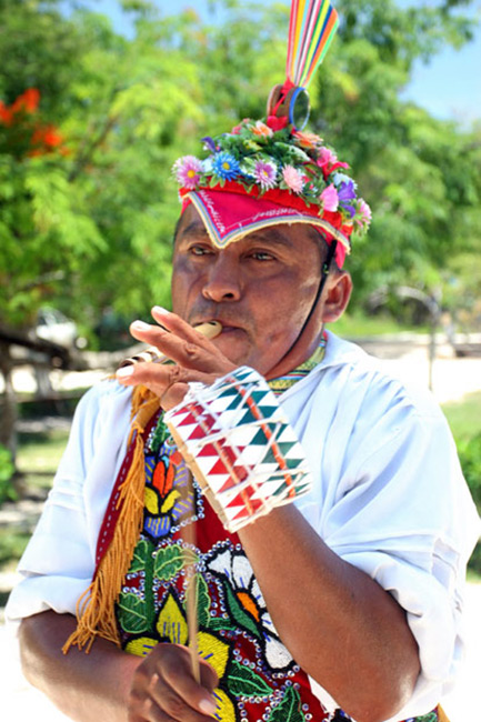 Mayan native performing for Tulum tourists