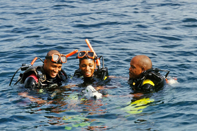 St. Lucia snorkelers with underwater camera