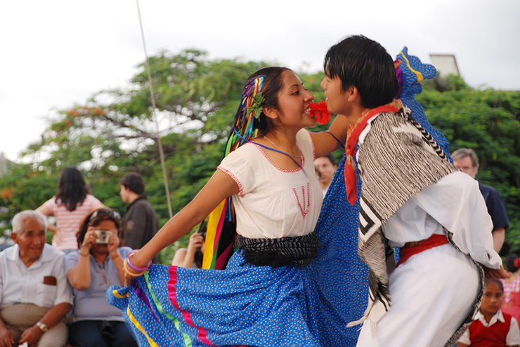 Two young people dancing a jarabe, Oaxaca Culture