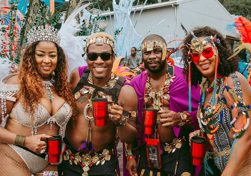 Mugs in hand, ready for St. Lucia Carnival