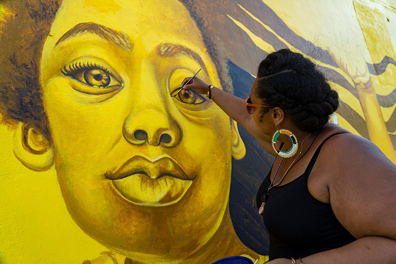 Talented muralist Princess Smith dropping visual verse in St. Petersburg