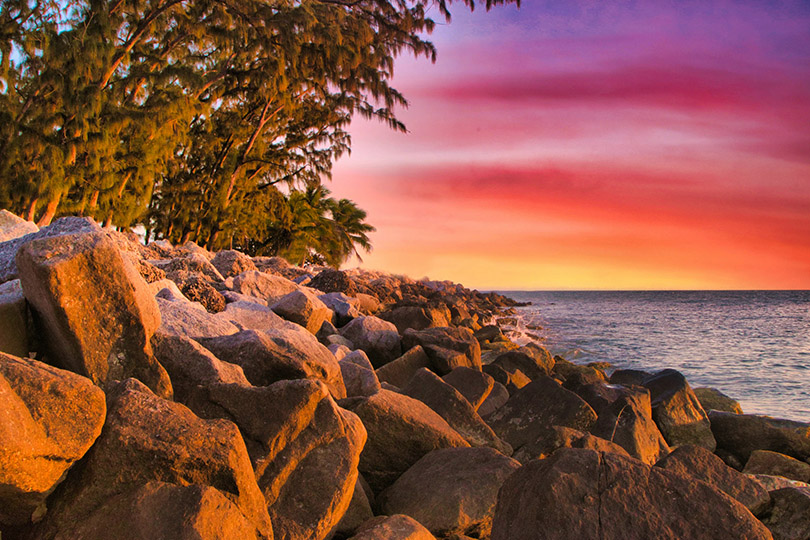 Sunset on a rocky, scenic beach at Key West