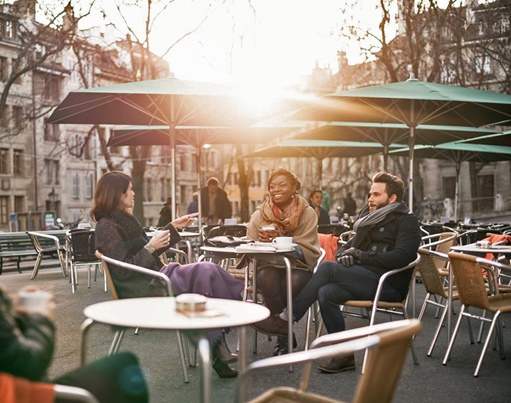 Friends enjoying hot chocolate, Geneva Cafe