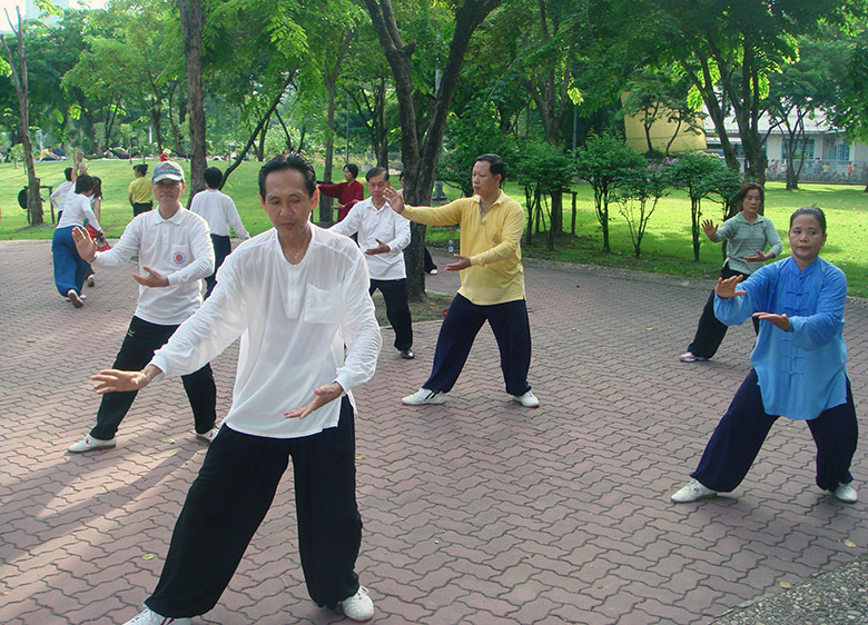 Practicing Tai Chi in Lumphini Park, Bangkok