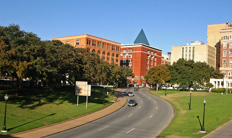 Dealey Plaza with Texas School Book Depository in Dallas; (c) Soul Of America
